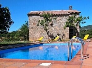 It has a large garden & private swimming pool