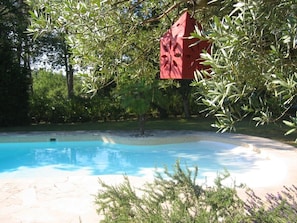Beautiful swimming pool with beach effect
