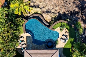 AERIAL VIEW OF BEAUTIFUL INFINITY POOL, SPA AND LANAI