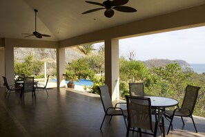 This 3-foot glass railing allows you to enjoy a HUGE unobstructed ocean view.