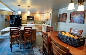 Kitchen and dining area with seating for 10