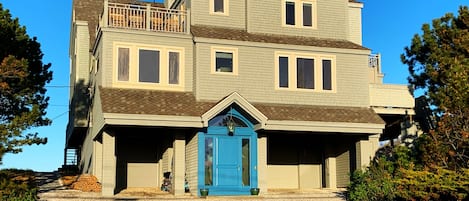 Welcome to our luxury beach house w/parking for 8 cars. Sunset deck on top left.