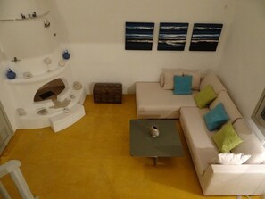 modern and cozy living room with view of the sea