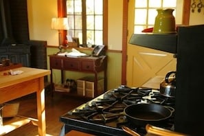 The spacious and bright country kitchen. 