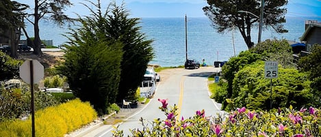 Gorgeous ocean view from deck, family room and dining room. Steps to the beach.