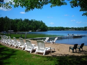 Gradual Sandy Beach. Our pier and Row Boat....only yards from our Cabin!