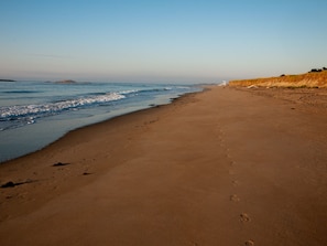 A 3-mile stretch of flat sand beach, Popham, is a rarity along the rocky coast.
