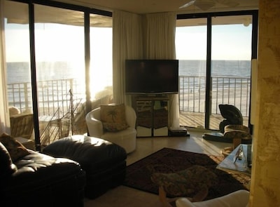 View From Living Room onto Wrap Around Balcony and Beach