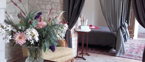 Hydrangea suite with a four poster bed, for a romantic stay.