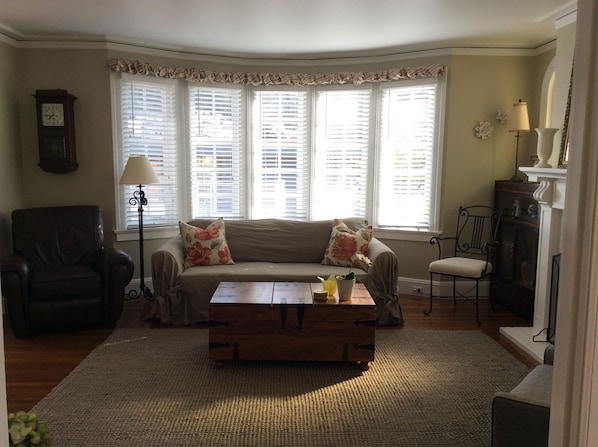 Bay windows offer a bright sunny living room.