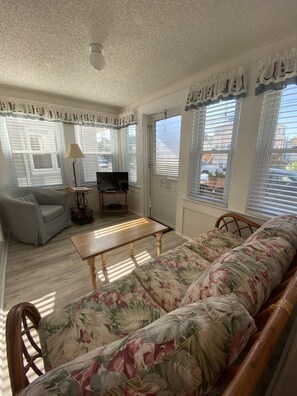 Entry with seating and TV

