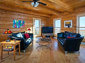 Open concept living room. Satellite HD TV. Speakers for your iPod. WiFi.