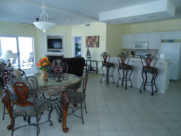 View of Dining, Kitchen, and Living Room Overlooking Lake.