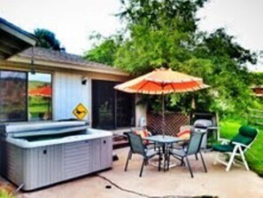 back patio with hot tub