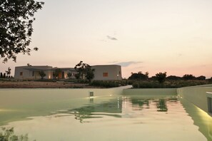 This is a 13 by 3 mts pool, comfy enough for swimming, with solarium. No diving