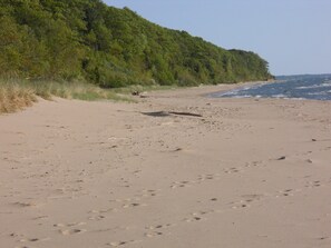 Beach to south. [Record high lake levels has resulted in more limited beach]