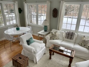 open plan living room/dining room