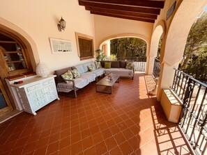 Spacious covered Naya overlooking the pool giving welcome outside shade
