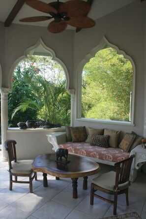 outdoor (covered) living room overlooking your pool.  Handcrafted moldings