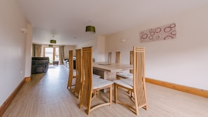 Dining area with marble table and dining for 7.