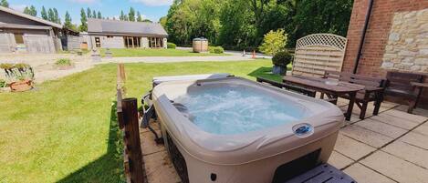 Private hot tub with garden views