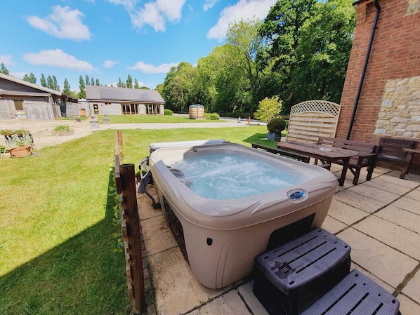 Private hot tub with garden views