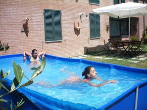 Rigid swimming pool in the garden