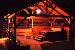 Hot Tub Pavilion has enough laid-back built-in seating to party!