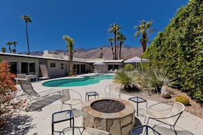 Expansive, private rear yard with pool and spa