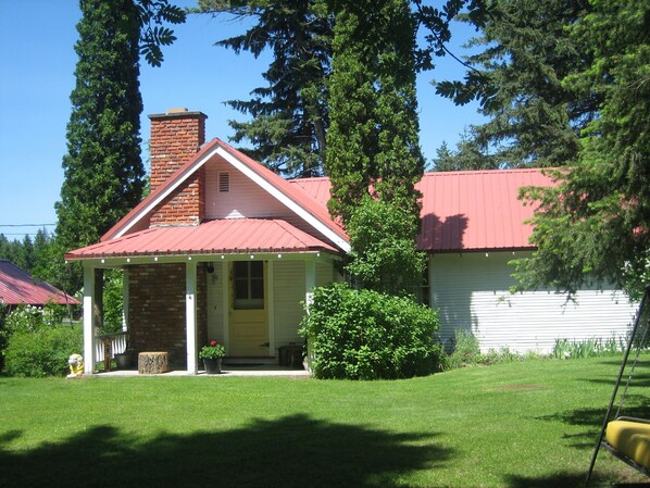 Front of the house (hidden from road by thick bushes).