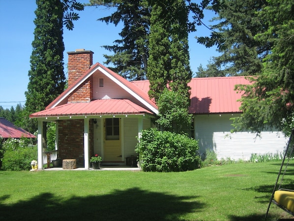 Front of the house (hidden from road by thick bushes).