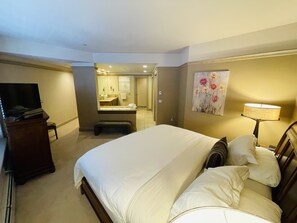 One of two spacious Primary bedrooms with a jetted sunken tub and 