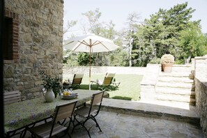 Garden seen from the kitchen. Castello di Montegiove. Leccino