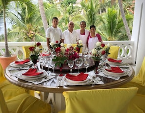 Our dedicated staff with elegant place settings and service.