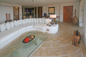 Your beautiful living room sofa seats 8 !!