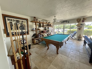 Pool Table and views of Open Terrace on first floor.