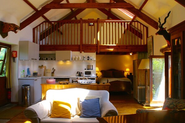 The bedroom can be separated from the living area by a heavy curtain.