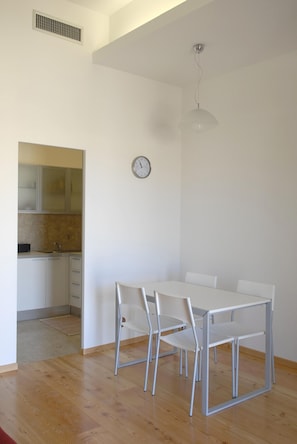 The dining table seats four