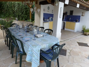 Outside dining area and Summer Kitchen.