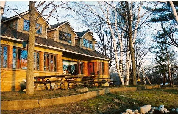 Front of House and patio as seen from top of bluff