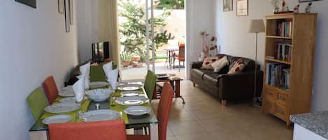 Open plan living dining area which leads out onto the patio garden area 