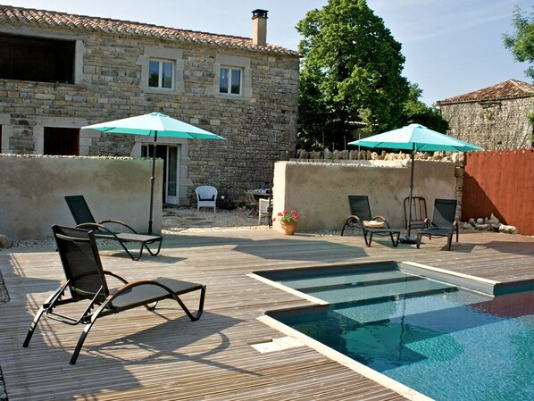 The Cottage with rear terrace and pool deck