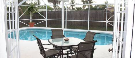 French doors out to the pool.