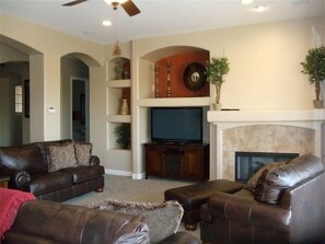 Inviting family room/perfect for relaxing! Lots of seats for viewing
the 50" TV-