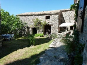 Large courtyard with 2 separate L-shaped buildings