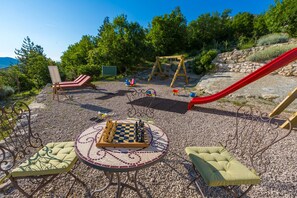 VILLA TRIBALJ Kids park with slide, 2 swings, drawing board, sand box & sunbeds
