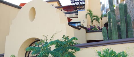 Casa Amistad -- Friendship House -  welcomes you through a gated courtyard with fountain. Beyond the gate, you will find a spacious private two-bedroom unit with ocean view. 