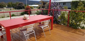 Large table & chairs on front deck