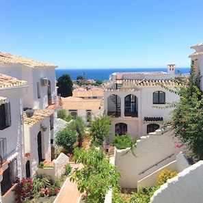 Two large terraces with sea and mountain views