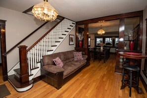 Another angle of the living room with authentic, craftsman woodworking.